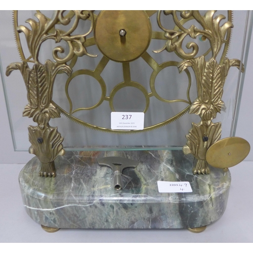 237 - A French Greater Wheel clock, pin-wheel escapement, on a marble base, with key, height 50cm