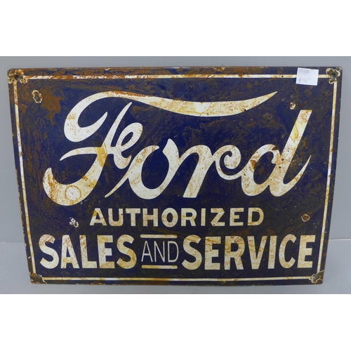 242 - An enamelled metal Ford Authorized Sales and Service sign