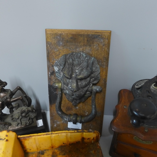 246 - A vintage brass door knocker, Tonka truck, coffee grinder and one other