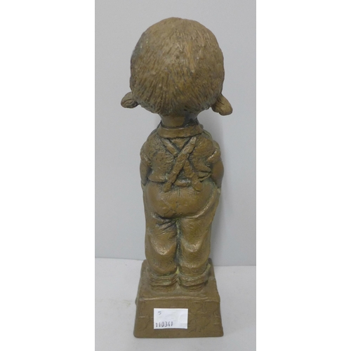 254 - A faux bronze figure of a young girl