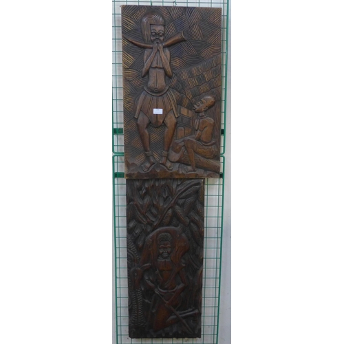 259 - Two African carved wooden plaques