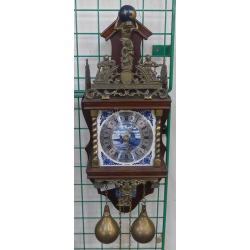 261 - A Dutch mahogany and brass wall clock