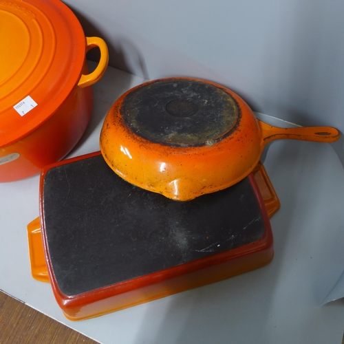 264 - Three pieces of Le Creuset cookware