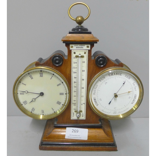 269 - A late Victorian walnut desk clock, barometer and thermometer, made by A&L Moses, Portsea. Sold with... 