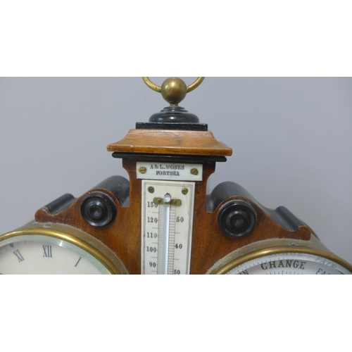 269 - A late Victorian walnut desk clock, barometer and thermometer, made by A&L Moses, Portsea. Sold with... 