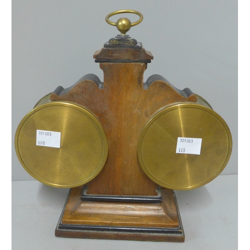 269 - A late Victorian walnut desk clock, barometer and thermometer, made by A&L Moses, Portsea. Sold with... 