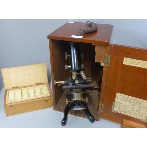 280 - A vintage cased microscope with slides, W. Watson & Sons Ltd., London