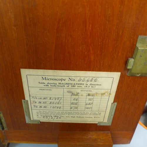 280 - A vintage cased microscope with slides, W. Watson & Sons Ltd., London