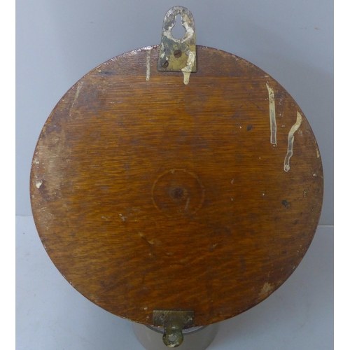 284 - An early 20th Century Dent carved oak circular wall clock