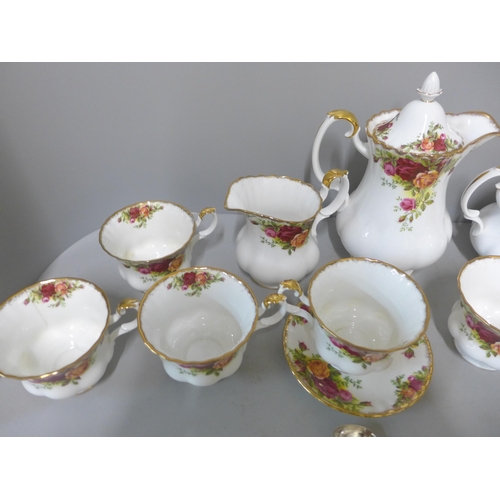 287 - A Royal Albert Old Country Roses six setting tea service and a coffee pot