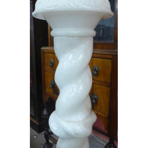 292 - A French onyx barleytwist jardiniere stand