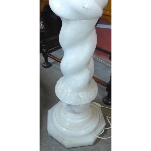 292 - A French onyx barleytwist jardiniere stand