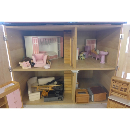 298 - A painted doll's house with accessories