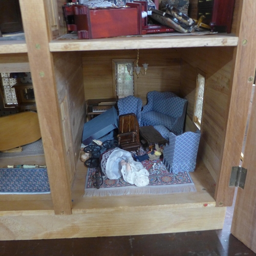 299 - A large wooden doll's house with accessories