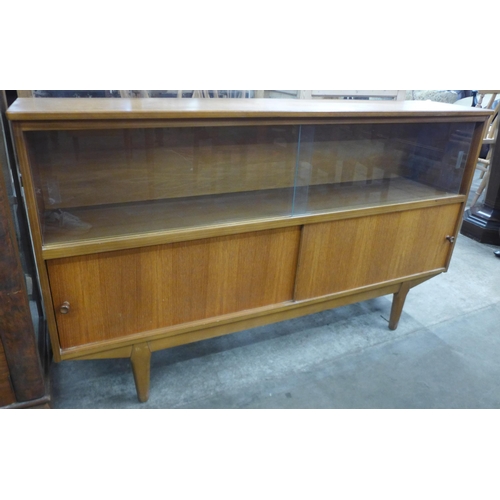 33 - A teak bookcase