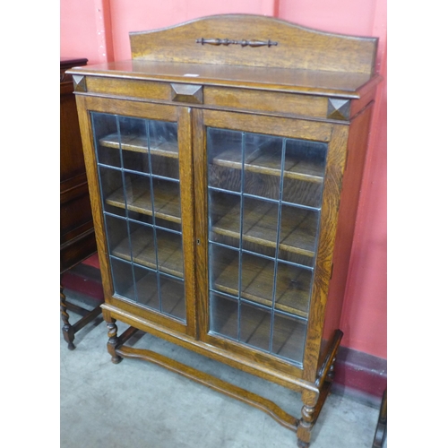 38 - An early 20th Century oak two door bookcase