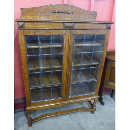 38 - An early 20th Century oak two door bookcase