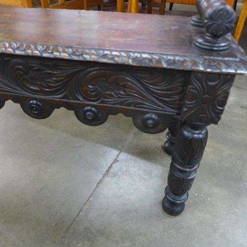 49 - A Victorian Jacobean Revival carved oak window seat