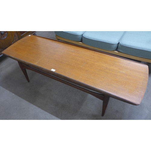 6 - A teak coffee table