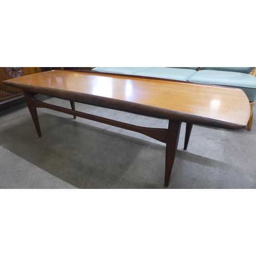 6 - A teak coffee table