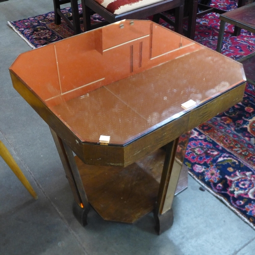 60 - An Art Deco peach mirrored glass coffee table