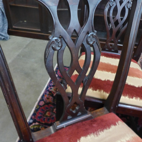 62 - A set of four George III mahogany dining chairs