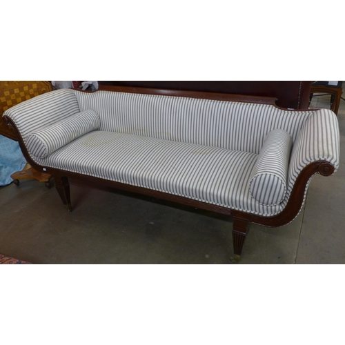 67 - A Regency mahogany and upholstered scroll arm settee