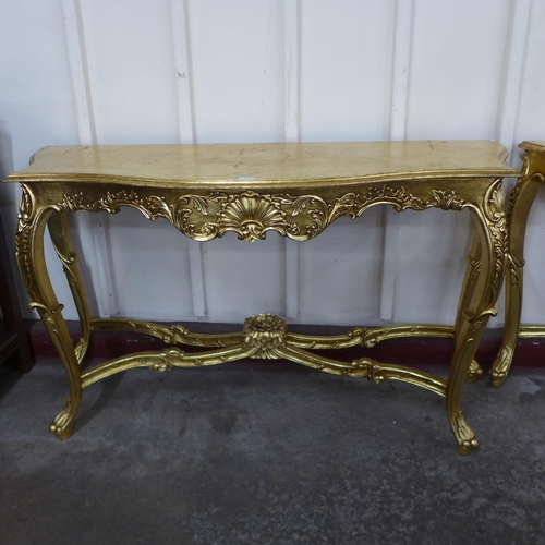 69 - A pair of Louis XV style giltwood console tables