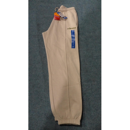 3290 - Four pairs of ladies cream Ellesse joggers, size L *This lot is subject to VAT