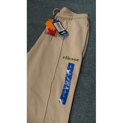 3290 - Four pairs of ladies cream Ellesse joggers, size L *This lot is subject to VAT