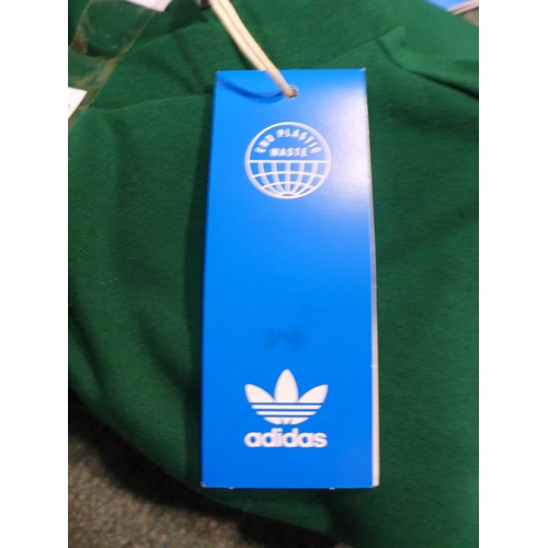 3304 - Three men's green Adidas T-Shirts, size L *This lot is subject to VAT