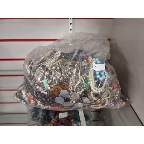 2172A - A bag of approx. 8kg of assorted costume jewellery