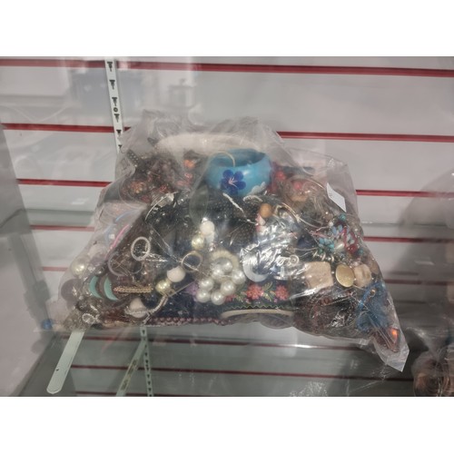 2172B - A bag of approx.. 8kg of assorted costume jewellery