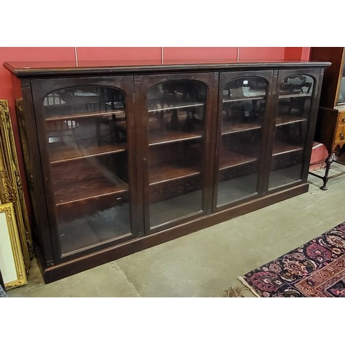 56 - A late Victorian mahogany four door bookcase