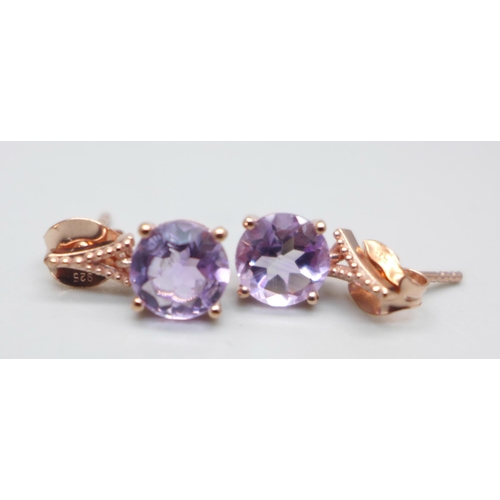 1001 - A pair of silver gilt and pink amethyst earrings