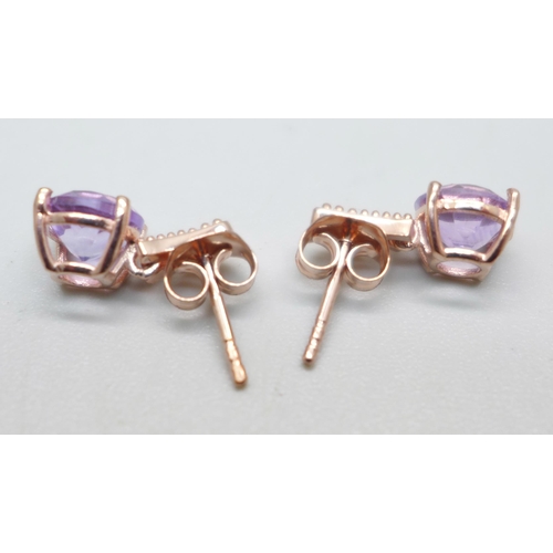 1001 - A pair of silver gilt and pink amethyst earrings