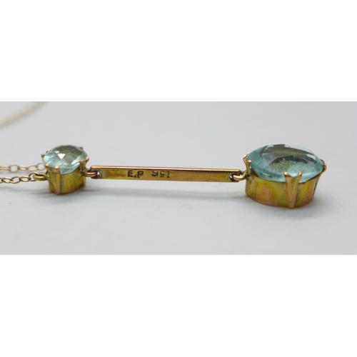 1007 - A vintage 9ct gold and aquamarine necklace, 38cm