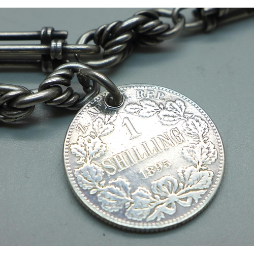 1010 - A silver fancy link Albert watch chain, T-bar marked Birmingham 1896, with 1895 South Africa shillin... 