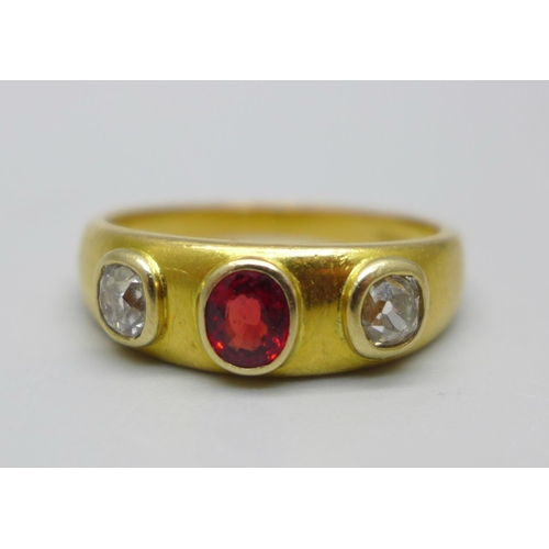 1014 - An 18ct gold, ruby and diamond ring, 6.4g, P, diamonds approximately 0.25ct weight each