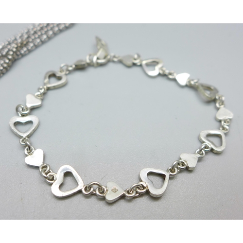 1024 - Two silver bracelets and a silver neck chain, 25g, chain 74cm