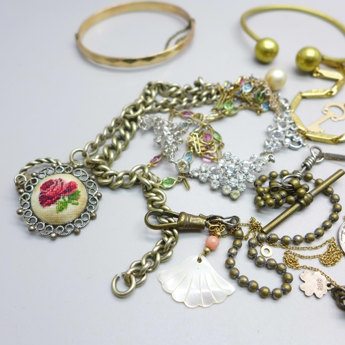 1025 - Vintage jewellery including a coral bracelet, a '1/5th 9ct bronze core' bangle, etc.