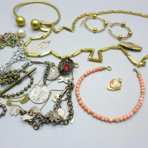 1025 - Vintage jewellery including a coral bracelet, a '1/5th 9ct bronze core' bangle, etc.