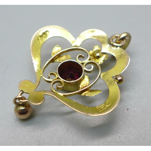 1036 - A 9ct gold and garnet pendant, 1.2g