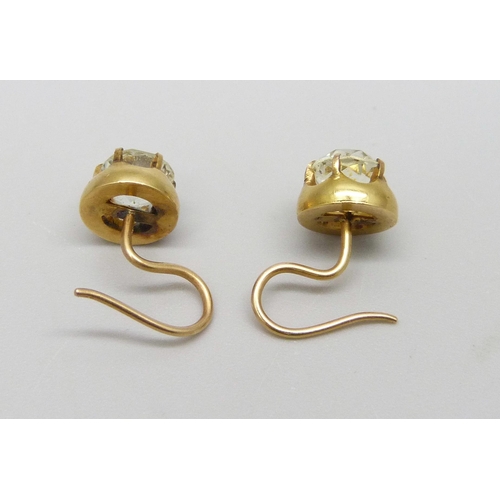 1043 - A pair of Georgian yellow metal stone set earrings, 2.9g