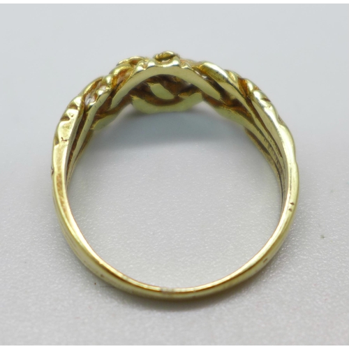 1050 - A yellow metal ring, tests as 14ct gold, 4.1g, O/P