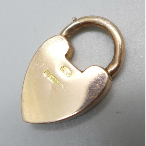 1054 - A 9ct gold padlock clasp with unusual mechanism, 2.9g