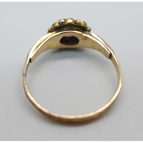 1055 - A Victorian 12ct gold ring set with garnet and seed pearl, Birmingham 1866, marked 12 and .5, 1.6g, ... 