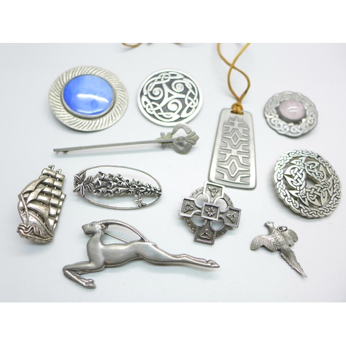 1068 - Pewter jewellery including St. Justin and Norwegian