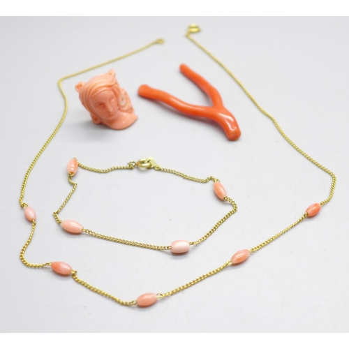 1070 - A coral set necklace and matching bracelet and two pieces of coral