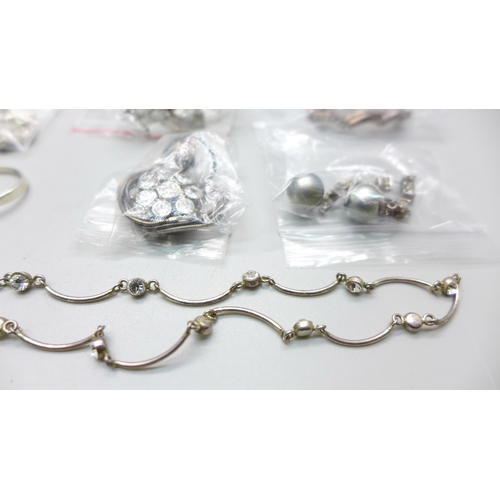 1079 - Silver jewellery including pendants and chains, earrings, etc.